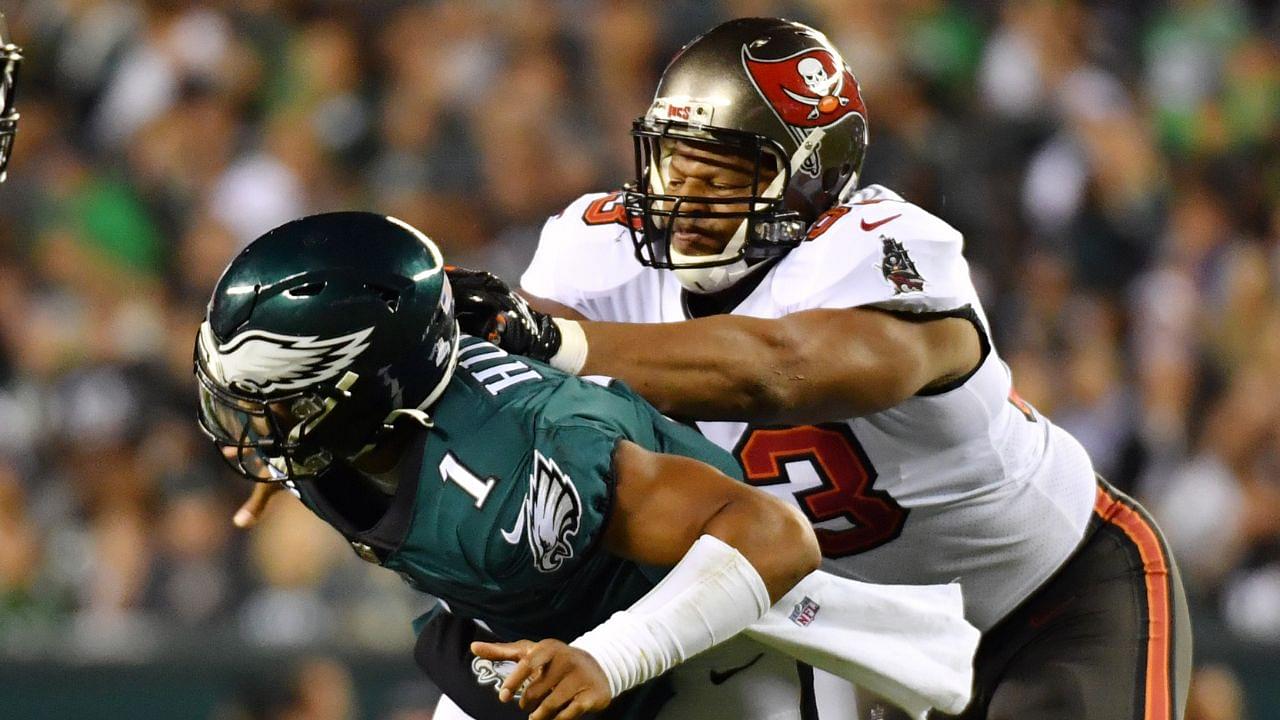 Jalen Hurts and Ndamukong Suh