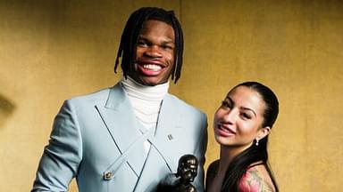 Travis Hunter with Leanna Lenee.