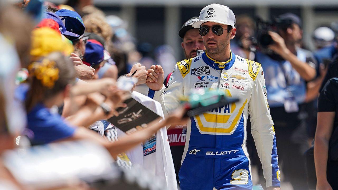 NASCAR Cup Series driver Chase Elliott (9) signs autographs for fans on Sunday, July 27, 2025, ahead of the Brickyard 400 at Indianapolis Motor Speedway.