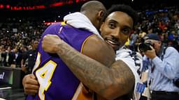 Los Angeles Lakers forward Kobe Bryant (24) hugs Atlanta Hawks guard Jeff Teague (0) after a game at Philips Arena. The Hawks defeated the Lakers 100-87.