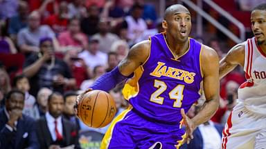 Los Angeles Lakers forward Kobe Bryant (24) and Houston Rockets forward Trevor Ariza (1) in action during the game between the Rockets and the Lakers at the Toyota Center. Bryant plays in the last road game and second to last game of his NBA career.
