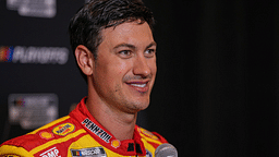 Joey Logano speaks to media members during the NASCAR Playoffs Media Day at the Charlotte Convention Center. Mandatory Credit: Jim Dedmon-Imagn Images