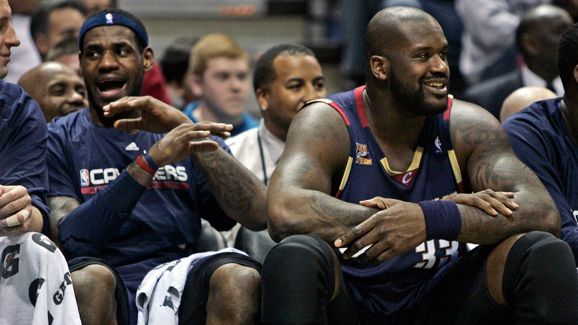 Bucks vs. Cavs Cleveland Cavaliers LeBron James and Shaquille O Neal enjoy a laughter against the Milwaukee Bucks at the Bradley Center in Milwaukee, Wisconsin, Sunday, December 6, 2009.