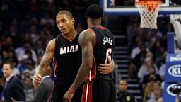 Miami Heat small forward Michael Beasley (8) talks with small forward LeBron James (6) during the second quarter at Amway Center.