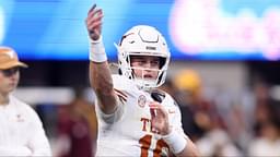 Texas Longhorns quarterback Arch Manning (16) warms up before the Peach Bowl at Mercedes-Benz Stadium.