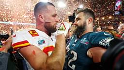 Kansas City Chiefs tight end Travis Kelce (87) talks with his brother Philadelphia Eagles center Jason Kelce (62) after he won Super Bowl LVII at State Farm Stadium.