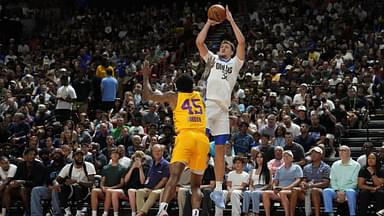 Dallas Mavericks forward Cooper Flagg (32) shoots against Los Angeles Lakers guard DaJaun Gordon (45) in the first quarter of their game at Thomas & Mack Center.