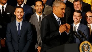 President Barack Obama (center) imitates a celebration dance of Golden State Warriors guard Stephen Curry (center) while speaking during a ceremony honoring the 2015 NBA Champion Warriors in the East Room at the White House.