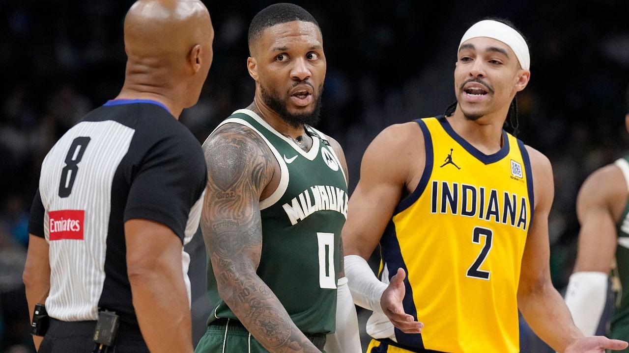 Milwaukee Bucks guard Damian Lillard (0) and Indiana Pacers guard Andrew Nembhard (2) talk with referee Marc Davis during game three of first round for the 2024 NBA Playoffs at Fiserv Forum