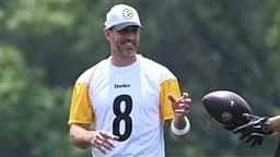 Jun 10, 2025; Pittsburgh, PA, USA; Pittsburgh Steelers quarterback Aaron Rodgers (8) gets the ball during minicamp at their South Side facility.