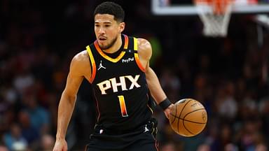 Phoenix Suns guard Devin Booker (1) dribbles the ball against the Oklahoma City Thunder during the first half at Footprint Center.