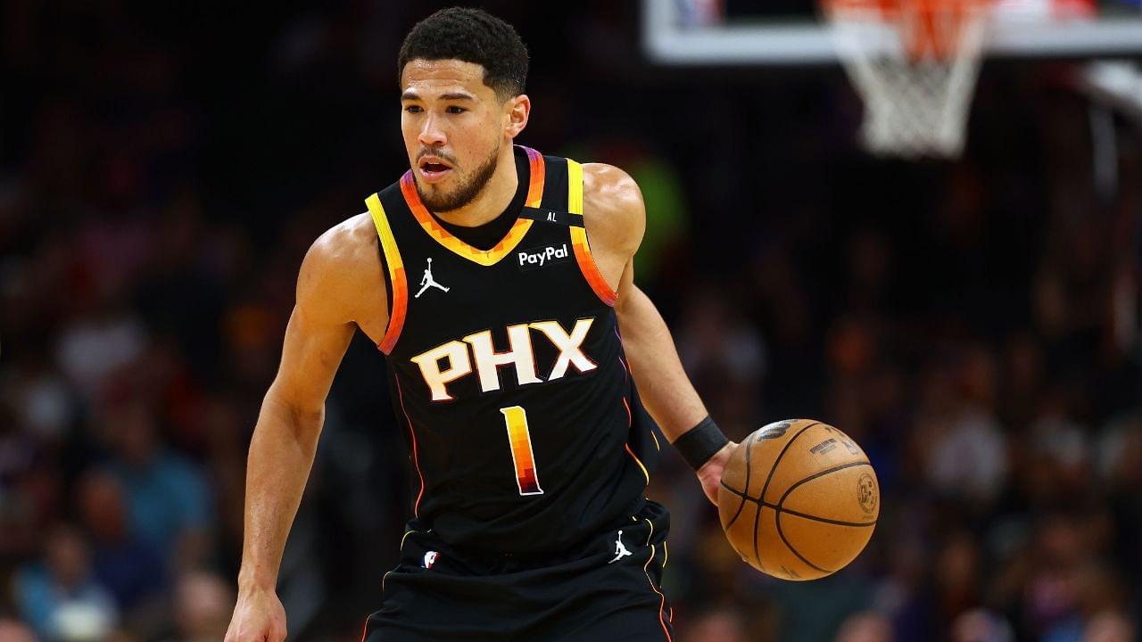 Phoenix Suns guard Devin Booker (1) dribbles the ball against the Oklahoma City Thunder during the first half at Footprint Center.