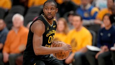 Golden State Warriors forward Jonathan Kuminga (00) holds onto the ball against the Minnesota Timberwolves in the fourth quarter during game four of the second round for the 2025 NBA Playoffs at Chase Center.