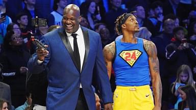 Feb 15, 2020; Chicago, Illinois, USA; Former NBA player Shaquille O'Neal laughs while standing next to Los Angeles Lakers player Dwight Howard during the slam dunk contest during NBA All Star Saturday Night at United Center.