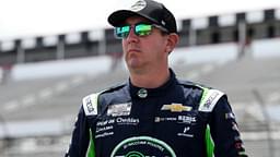 NASCAR Cup Series driver Kyle Busch looks on from pit road during practice and qualifying for The Great American Getaway 400 at Pocono Raceway.