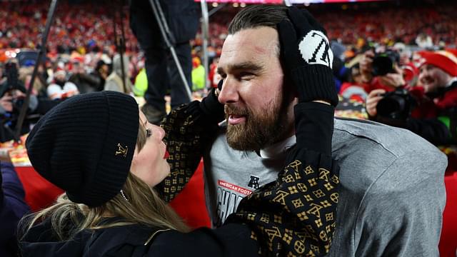 Recording artist Taylor Swift and Kansas City Chiefs tight end Travis Kelce (87) react after the AFC Championship game against the Buffalo Bills at GEHA Field at Arrowhead Stadium.