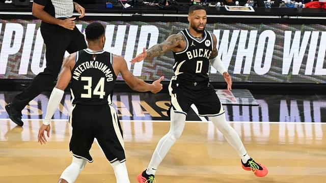Milwaukee Bucks guard Damian Lillard (0) and forward Giannis Antetokounmpo (34) celebrate after a play during the 3rd quarter of the Emirates NBA Cup championship game against the Oklahoma City Thunder at T-Mobile Arena