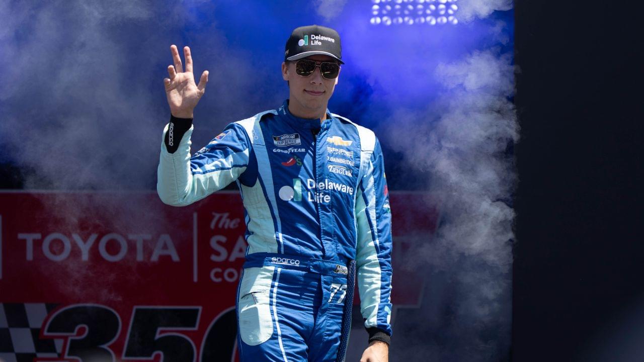 NASCAR Cup Series driver Carson Hocevar (77) waves after being introduced to fans before the start of the NASCAR Toyota / Save Mart 360 at Sonoma Raceway.