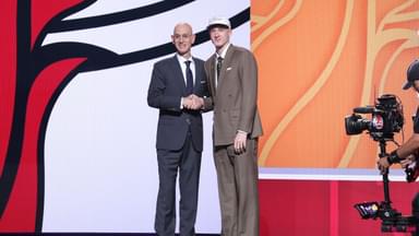 Kasparas Jakucionis stands with NBA commissioner Adam Silver after being selected as the 20th pick by the Miami Heat in the first round of the 2025 NBA Draft at Barclays Center.