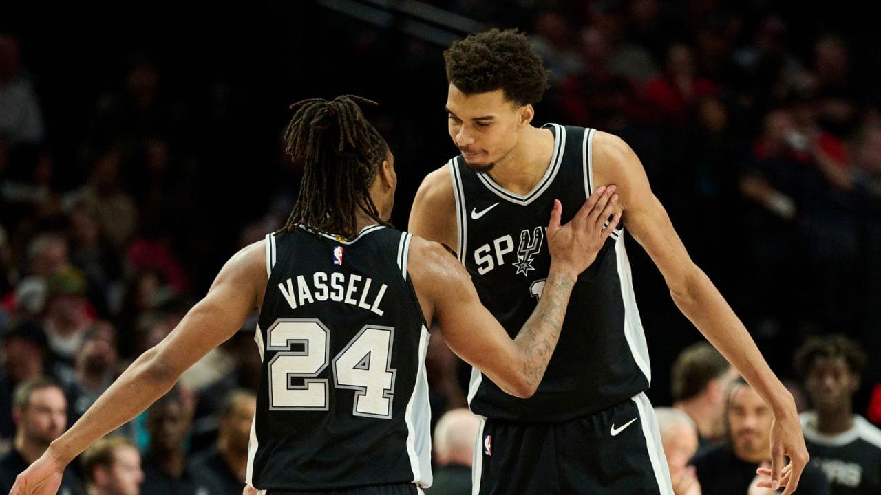 San Antonio Spurs guard Devin Vassell (24) and center Victor Wembanyama (1) celebrate during the second half in a game against the Portland Trail Blazers at Moda Center.