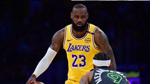 Los Angeles Lakers forward LeBron James (23) controls the ball against Minnesota Timberwolves guard Nickeil Alexander-Walker (9) during the first half in game five of first round for the 2025 NBA Playoffs at Crypto.com Arena.