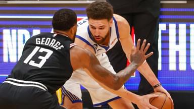 February 14, 2023, Los Angeles, California, USA: Golden State Warriors guard Klay Thompson (11) is defended by Los Angeles Clippers forward Paul George (13)