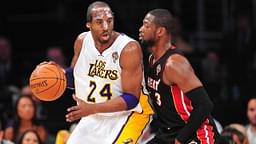 Los Angeles Lakers shooting guard Kobe Bryant (24) controls the ball against the defense of Miami Heat shooting guard Dwyane Wade (3) during the first half at Staples Center.