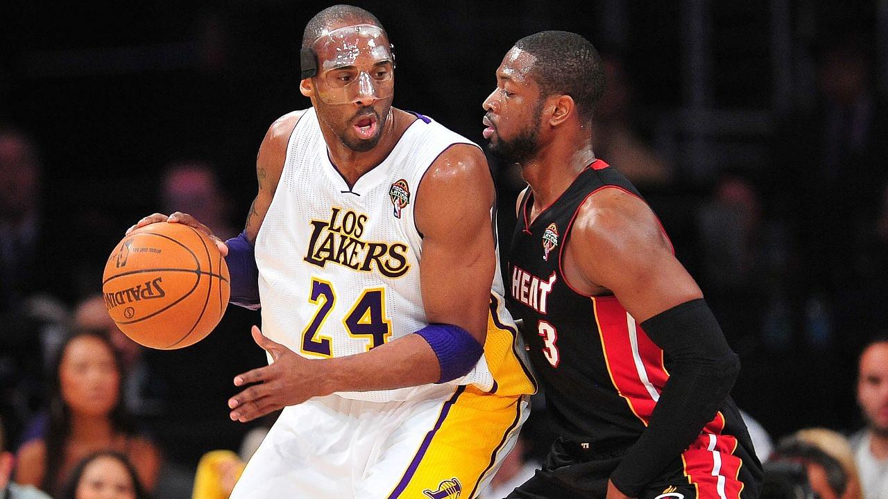 Los Angeles Lakers shooting guard Kobe Bryant (24) controls the ball against the defense of Miami Heat shooting guard Dwyane Wade (3) during the first half at Staples Center.