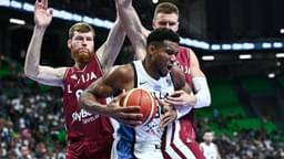 Giannis Antetokounmpo of Greece competes with Davis Bertans and Kristaps Porzingis of Latvia