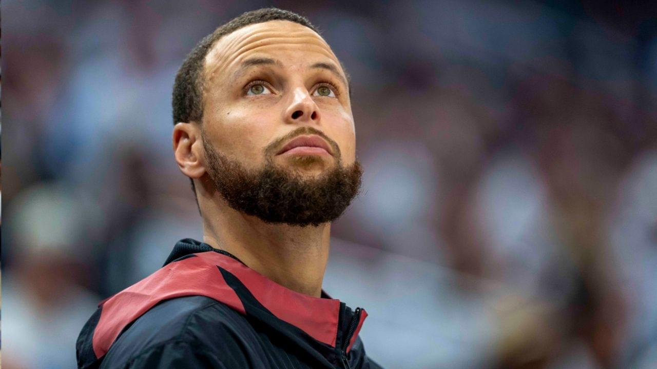 Golden State Warriors guard Stephen Curry (30) looks on from the bench against the Minnesota Timberwolves in the second half during game two of the second round for the 2025 NBA Playoffs at Target Center.