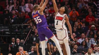 Phoenix Suns forward Kevin Durant (35) makes a three point basket against Houston Rockets forward Amen Thompson (1) in the second half at Toyota Center.