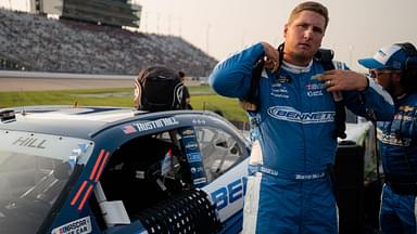 NASCAR Xfinity Series driver Austin Hill suits up before the Tennessee Lottery 250 at Nashville Superspeedway in Lebanon, Tenn., Saturday, May 31, 2025.