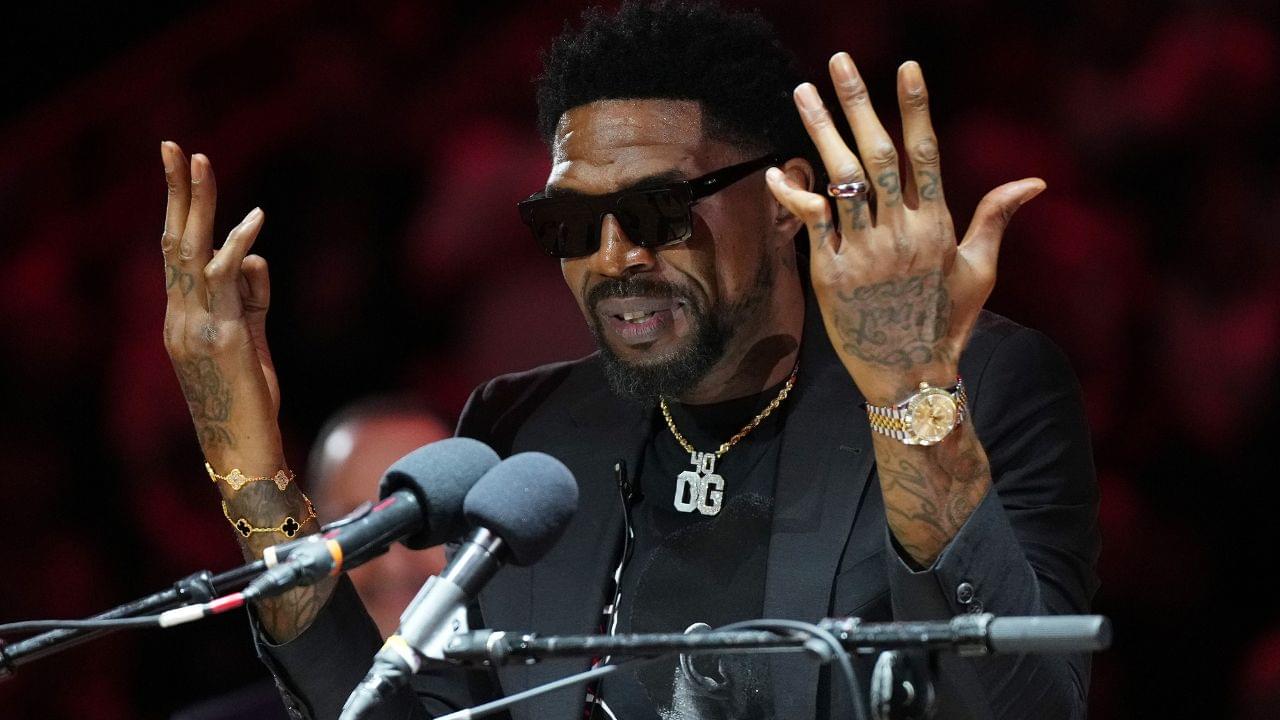 Udonis Haslem speaks after his jersey was lifted to the rafters during the retirement ceremony during halftime of the game between the Miami Heat and the Atlanta Hawks Kaseya Center.
