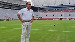 Alabama football coach Nick Saban stands on the turf inside Bryant-Denny Stadium during his team's media day in 2019.