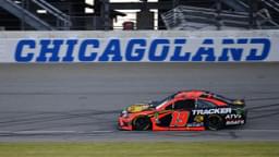 NASCAR Cup Series driver Martin Truex Jr. (19) competes during qualifying for the Camping World 400 at Chicagoland Speedway.