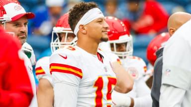 Kansas City Chiefs quarterback Patrick Mahomes (15) watches pregame warmups against the Seattle Seahawks at Lumen Field.