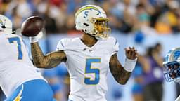 Jul 31, 2025; Canton, Ohio, USA; Los Angeles Chargers quarterback Trey Lance (5) throws in the second quarter against the Detroit Lions at Tom Benson Hall of Fame Stadium.