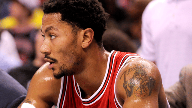 Dec 3, 2014; Charlotte, NC, USA; Chicago Bulls guard Derrick Rose (1) sits on the bench during the first half of the game against the Charlotte Hornets at Time Warner Cable Arena.