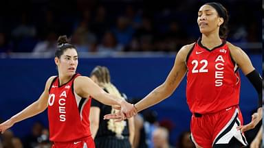Las Vegas Aces center A'ja Wilson (22) is congratulated by guard Kelsey Plum (10) after scoring against the Chicago Sky during the first half at Wintrust Arena.