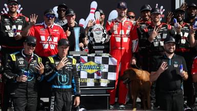 NASCAR Cup Series driver Shane Van Gisbergen celebrates with his team in victory lane after winning the Go Bowling at The Glen at Watkins Glen International.
