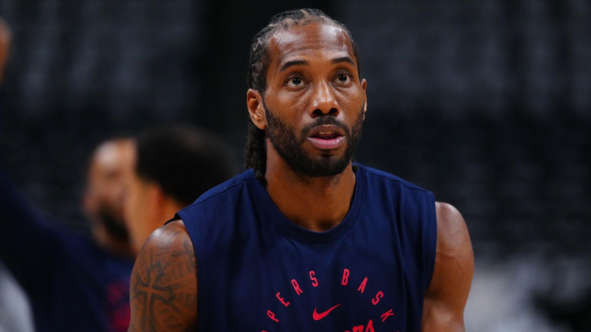 Apr 29, 2025; Denver, Colorado, USA; LA Clippers forward Kawhi Leonard (2) warms up before game five of the first round for the 2025 NBA Playoffs against the Denver Nuggets at Ball Arena.