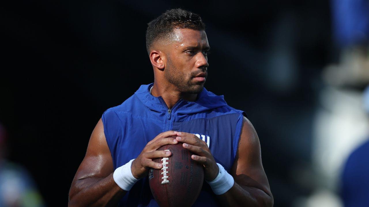 New York Giants quarterback Russell Wilson (3) warms up before the preseason game against the New York Jets at MetLife Stadium.