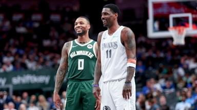 Mar 1, 2025; Dallas, Texas, USA; Dallas Mavericks guard Kyrie Irving (11) laughs with Milwaukee Bucks guard Damian Lillard (0) during the second half at American Airlines Center.