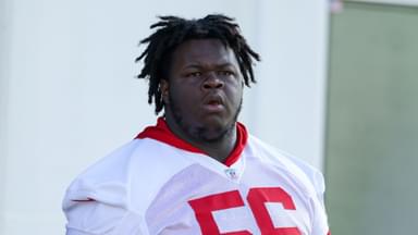 Tampa Bay Buccaneers defensive tackle Desmond Watson (56) looks on before training camp at AdventHealth Training Center.