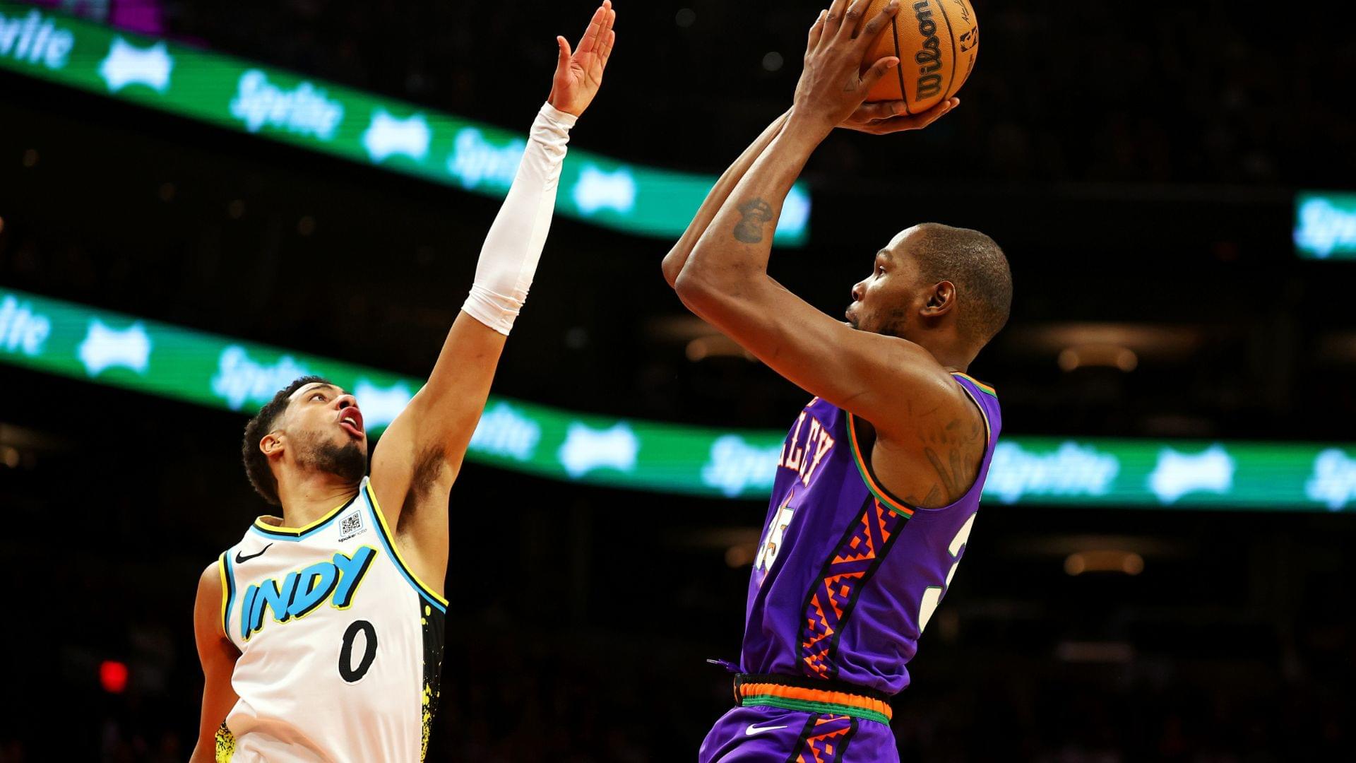 Dec 19, 2024; Phoenix, Arizona, USA; Phoenix Suns forward Kevin Durant (35) shoots the ball against Indiana Pacers guard Tyrese Haliburton (0) during the third quarter at Footprint Center.