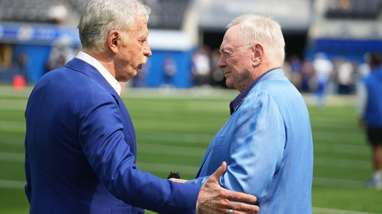 Los Angeles Rams owner Stan Kroenke (left) talks with Dallas Cowboys owner Jerry Jones during the game at SoFi Stadium.