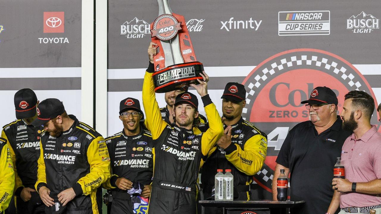 Ryan Blaney (22) and team celebrate the win during the Coke Zero Sugar 400 at Daytona International Speedway.