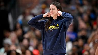 Indiana Fever guard Caitlin Clark (22) walks on to the court during the second half against the Dallas Wings at the American Airlines Center.