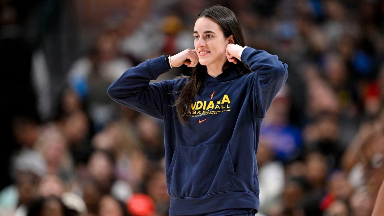 Indiana Fever guard Caitlin Clark (22) walks on to the court during the second half against the Dallas Wings at the American Airlines Center.