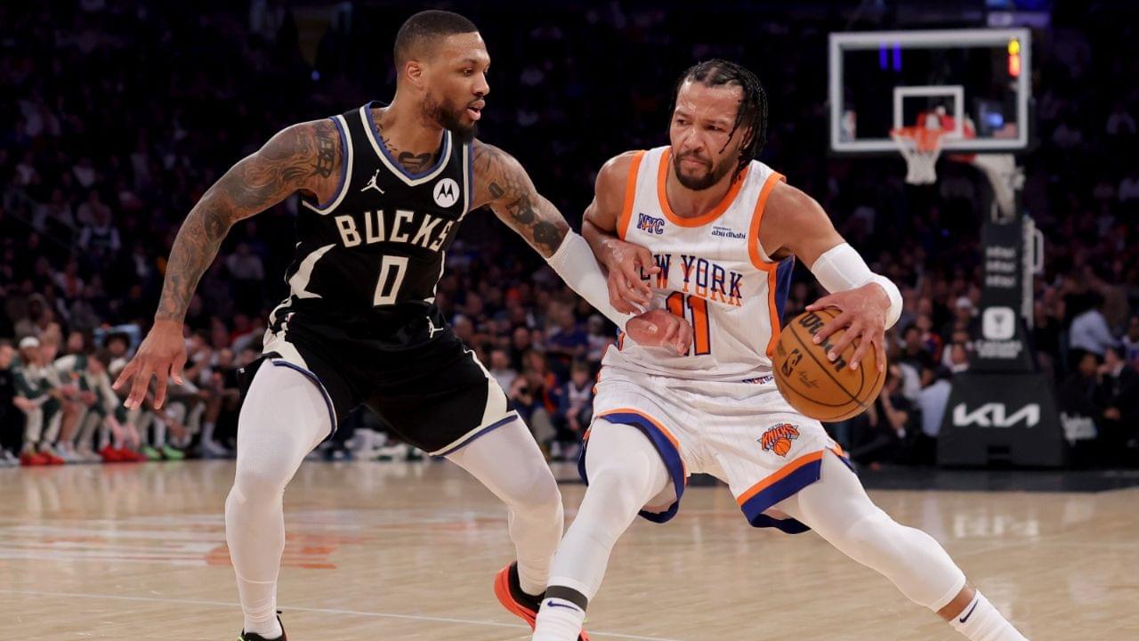 New York Knicks guard Jalen Brunson (11) controls the ball against Milwaukee Bucks guard Damian Lillard (0) during the first quarter at Madison Square Garden